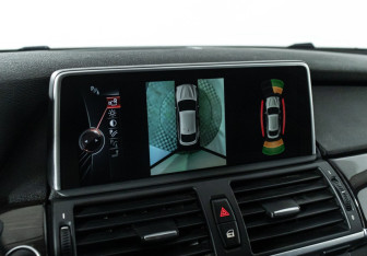 Подержанный автомобиль BMW X6 2013 года (17 фото)