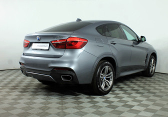 Подержанный автомобиль BMW X6 2019 года (23 фото)