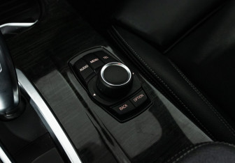 Подержанный автомобиль BMW X4 2015 года (18 фото)