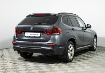 Подержанный автомобиль BMW X1 2014 года (5 фото)