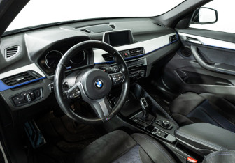 Подержанный автомобиль BMW X1 2018 года (11 фото)
