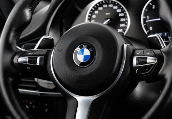 Подержанный автомобиль BMW X6 2018 года (14 фото)