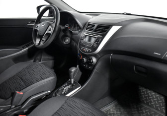 Подержанный автомобиль Hyundai Solaris Sedan 2014 года (13 фото)