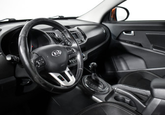 Подержанный автомобиль Kia Sportage 2013 года (9 фото)