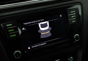 Подержанный автомобиль Skoda Rapid Liftback 2018 года (15 фото)