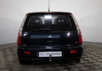 Подержанный автомобиль Mitsubishi Lancer Wagon 2005 года (6 фото)