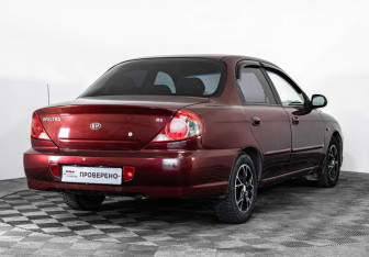 Подержанный автомобиль Kia Spectra Sedan 2008 года (5 фото)