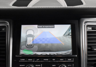 Подержанный автомобиль Porsche Macan 2014 года (18 фото)