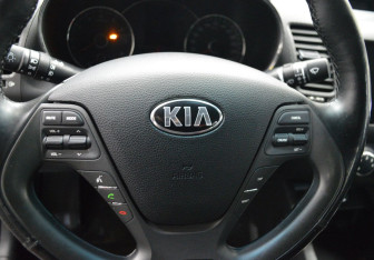 Подержанный автомобиль Kia Cerato Sedan 2014 года (15 фото)