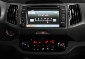 Подержанный автомобиль Kia Sportage 2014 года (15 фото)