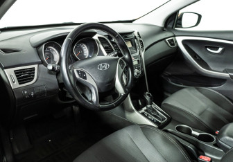 Подержанный автомобиль Hyundai i30 Hatchback 2015 года (11 фото)