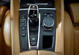 Подержанный автомобиль BMW X6 2016 года (10 фото)