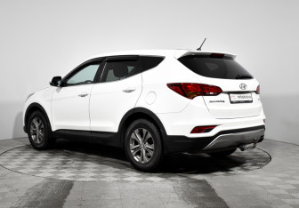 Подержанный автомобиль Hyundai Santa Fe 2015 года (7 фото)