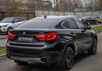 Подержанный автомобиль BMW X6 2015 года (5 фото)