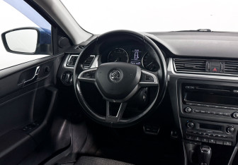 Подержанный автомобиль Skoda Rapid Liftback 2014 года (14 фото)