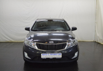 Подержанный автомобиль Kia Rio Sedan 2014 года (2 фото)