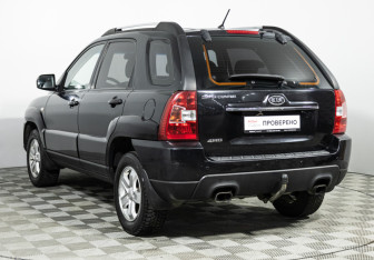 Подержанный автомобиль Kia Sportage 2009 года (7 фото)