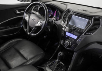 Подержанный автомобиль Hyundai Santa Fe 2014 года (9 фото)