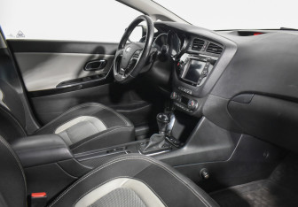Подержанный автомобиль Kia Ceed Wagon 2014 года (12 фото)