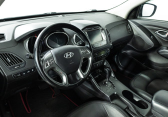 Подержанный автомобиль Hyundai ix35 2014 года (11 фото)