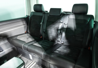 Подержанный автомобиль Volkswagen Multivan 2016 года (16 фото)