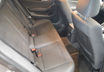 Подержанный автомобиль BMW X1 2012 года (13 фото)