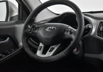 Подержанный автомобиль Kia Sportage 2013 года (15 фото)