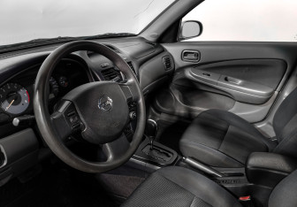 Подержанный автомобиль Nissan Almera Classic 2010 года (9 фото)