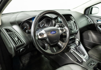 Подержанный автомобиль Ford Focus Hatchback 2014 года (11 фото)