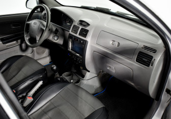 Подержанный автомобиль Kia Rio Wagon 2005 года (13 фото)