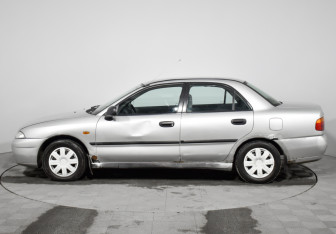 Подержанный автомобиль Mitsubishi Carisma Sedan 1998 года (2 фото)