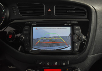 Подержанный автомобиль Kia Ceed Wagon 2014 года (16 фото)