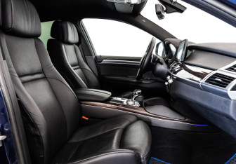Подержанный автомобиль BMW X6 2013 года (24 фото)