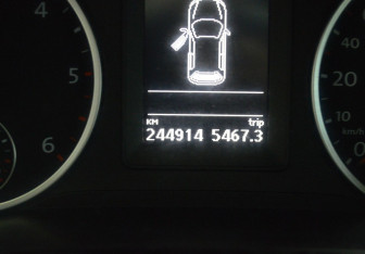 Подержанный автомобиль Volkswagen Tiguan 2011 года (15 фото)