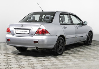 Подержанный автомобиль Mitsubishi Lancer Sedan 2005 года (5 фото)