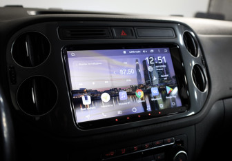 Подержанный автомобиль Volkswagen Tiguan 2011 года (15 фото)