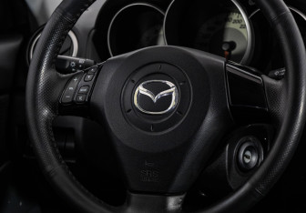 Подержанный автомобиль Mazda 3 Sedan 2008 года (11 фото)