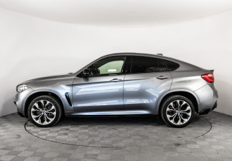 Подержанный автомобиль BMW X6 2018 года (10 фото)
