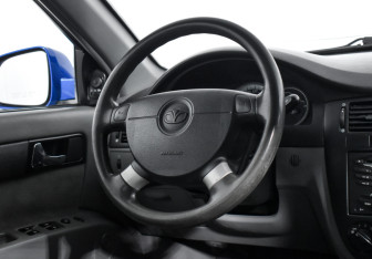Подержанный автомобиль Daewoo Gentra Sedan 2014 года (14 фото)