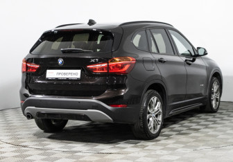 Подержанный автомобиль BMW X1 2016 года (5 фото)