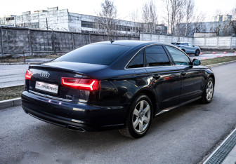 Подержанный автомобиль Audi A6 Sedan 2015 года (4 фото)