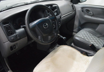 Подержанный автомобиль Mazda Tribute 2001 года (10 фото)