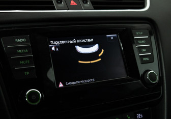 Подержанный автомобиль Skoda Octavia Liftback 2014 года (15 фото)