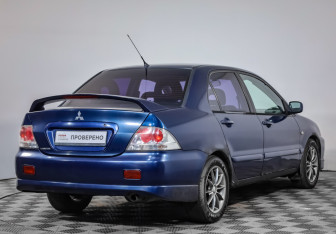 Подержанный автомобиль Mitsubishi Lancer Sedan 2006 года (5 фото)
