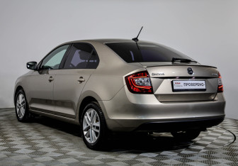 Подержанный автомобиль Skoda Rapid Liftback 2018 года (7 фото)