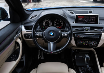 Подержанный автомобиль BMW X1 2021 года (15 фото)