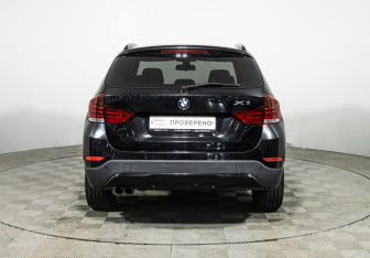 Подержанный автомобиль BMW X1 2013 года (6 фото)