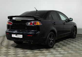 Подержанный автомобиль Mitsubishi Lancer Sedan 2012 года (5 фото)
