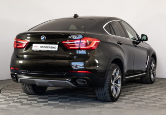 Подержанный автомобиль BMW X6 2015 года (5 фото)