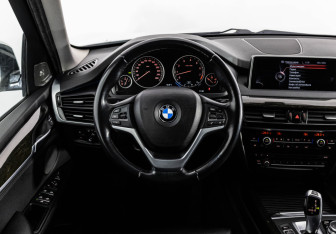 Подержанный автомобиль BMW X5 2016 года (14 фото)